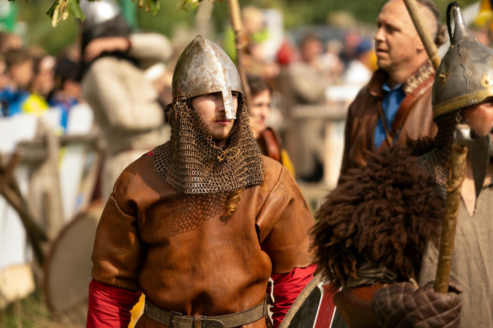 Viking reenactment scene with actors in traditional armor during a history festival in Szczecin, Poland.