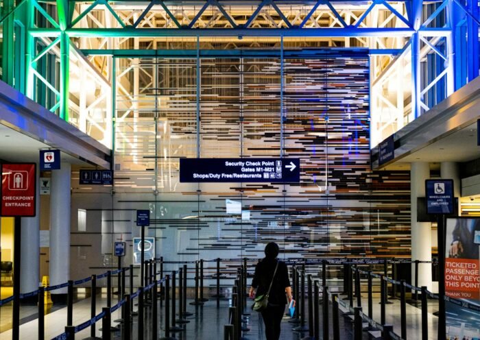 A traveler enters the security checkpoint at O'Hare Airport terminal, Chicago.